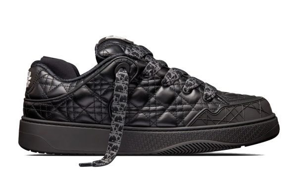 a black sneaker with a lace up