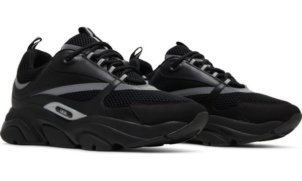a pair of black and grey sneakers