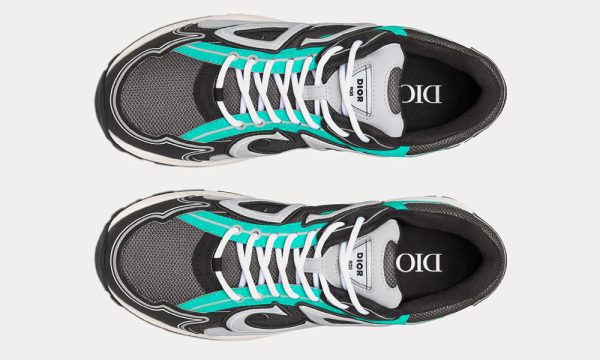 a pair of black and white sneakers